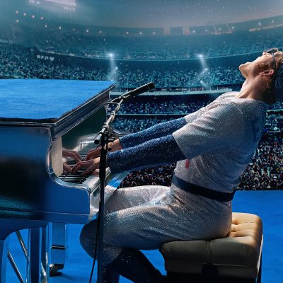Rocketman’s Blast from the Past Gloriously Outré, Two Huge Legal Fails, Downton Abbey Redux Prep, Angels, Devils, Designers and Keanu Reeves Alert!