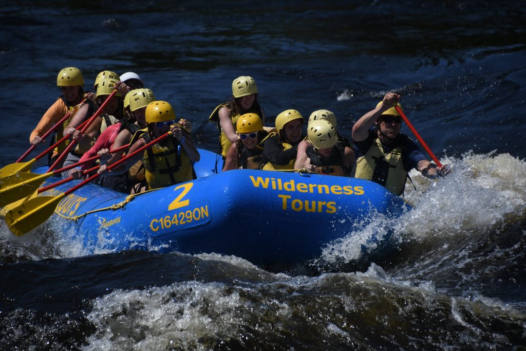 women white water rafting