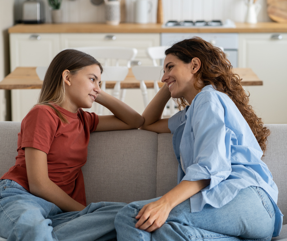 talking with teenager on couch in calm state 
