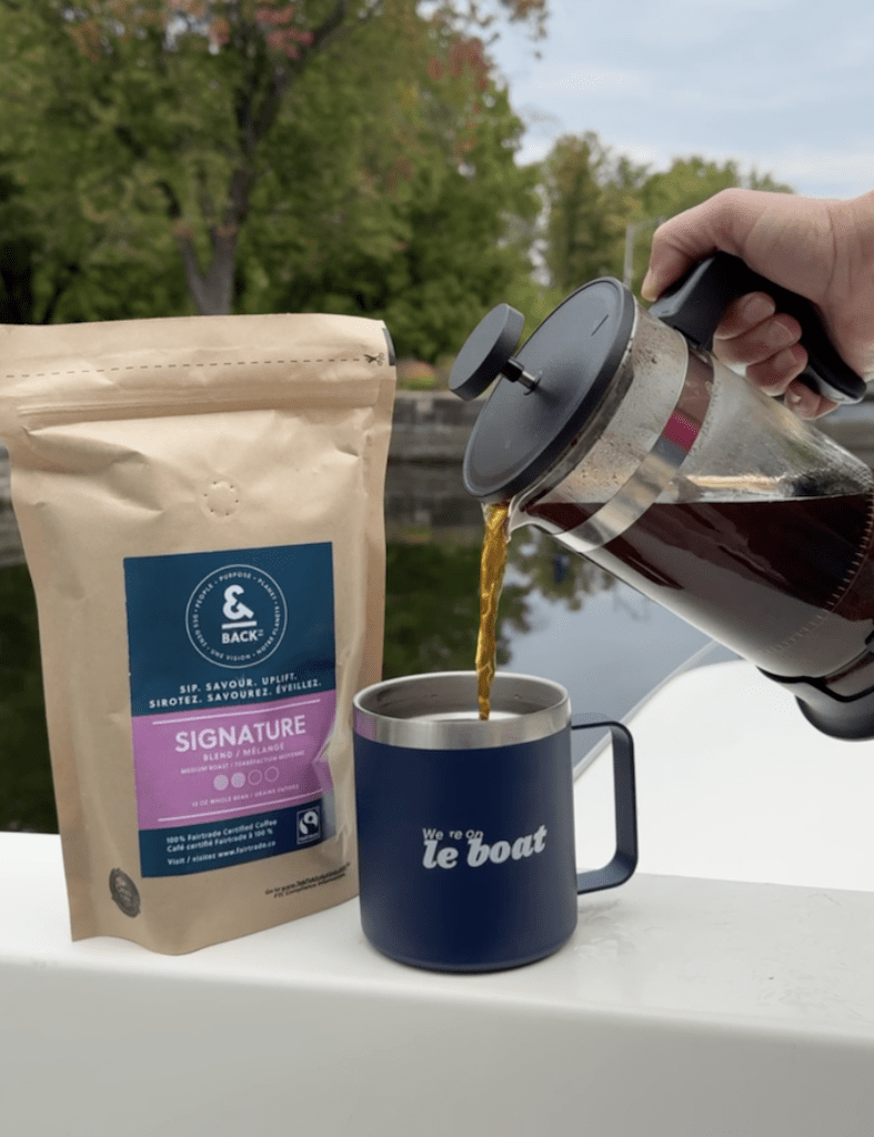 Ethical coffee brands Canada. Andback Coffee being poured on the deck of a Le Boat on the Rideau Canal.